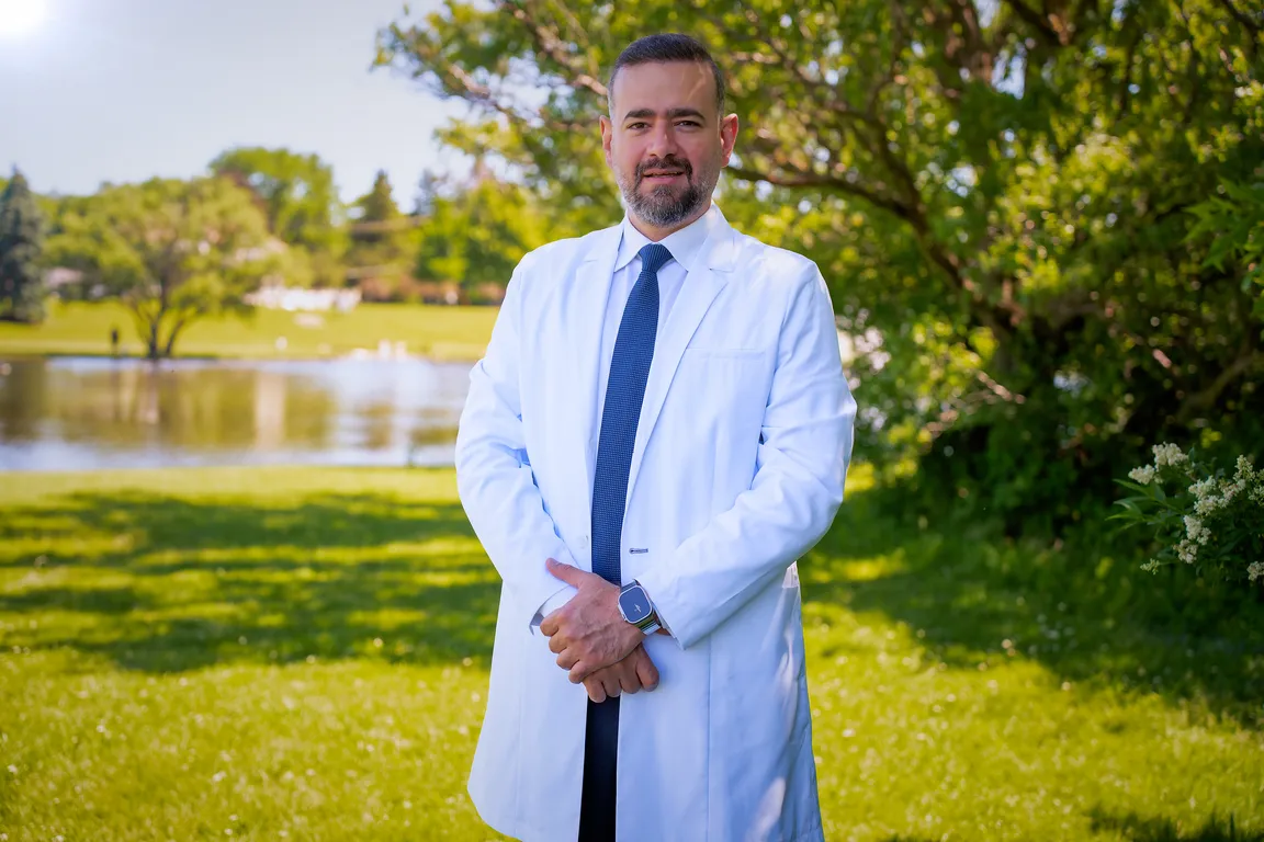 A Mount Prospect Dental Care dentist in a white coat outside the practice