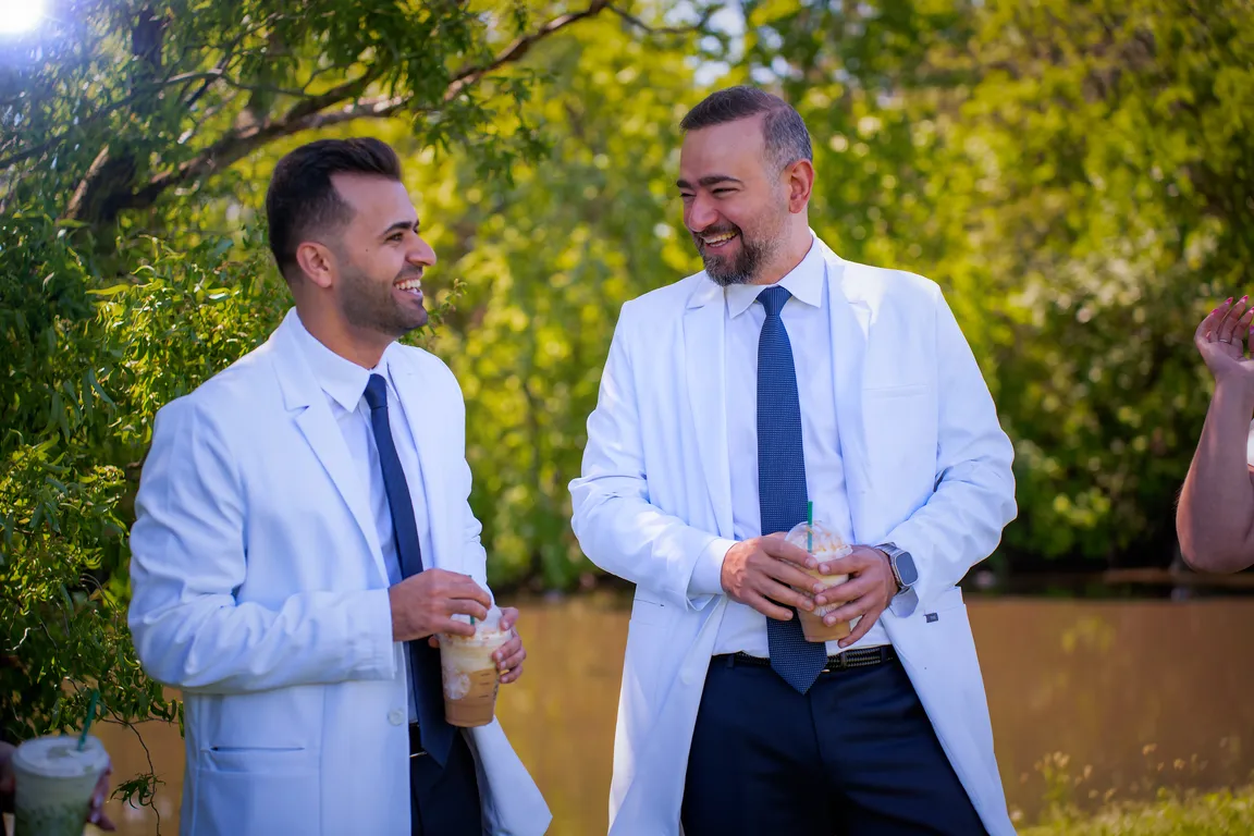 Two Mount Prospect Dental Care dentists talking outside the Mount Prospect, IL practice